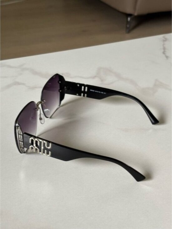 Miu Miu Black Frames with Purple Gradient Lenses Oversized Sunglasses